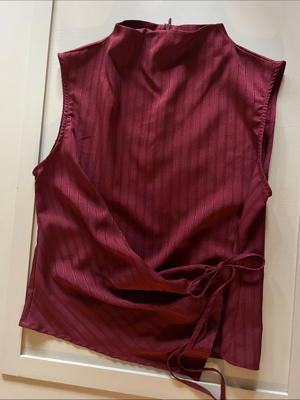 Cider Sleeveless Mock Neck Wrap-Front Top in Deep Burgundy